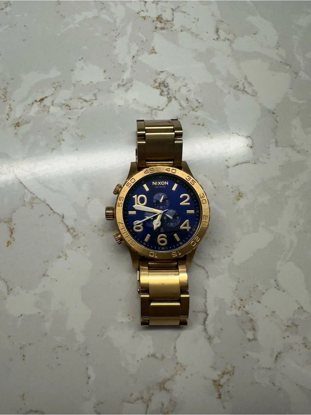 Nixon Gold-Tone Bracelet Watch with Blue Dial